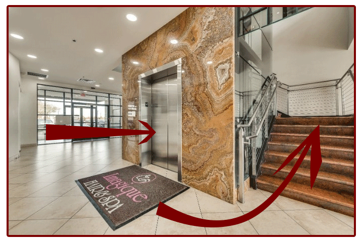 picture of the lobby showing the elevator and stairs