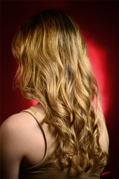 Picture of the back of the head of a blonde girl.